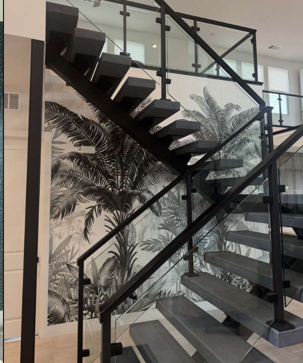 Tropical mural beside a floating staircase