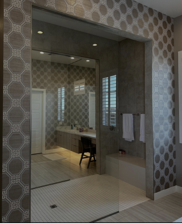 Geometric patterned wallcovering framing a walk-in shower